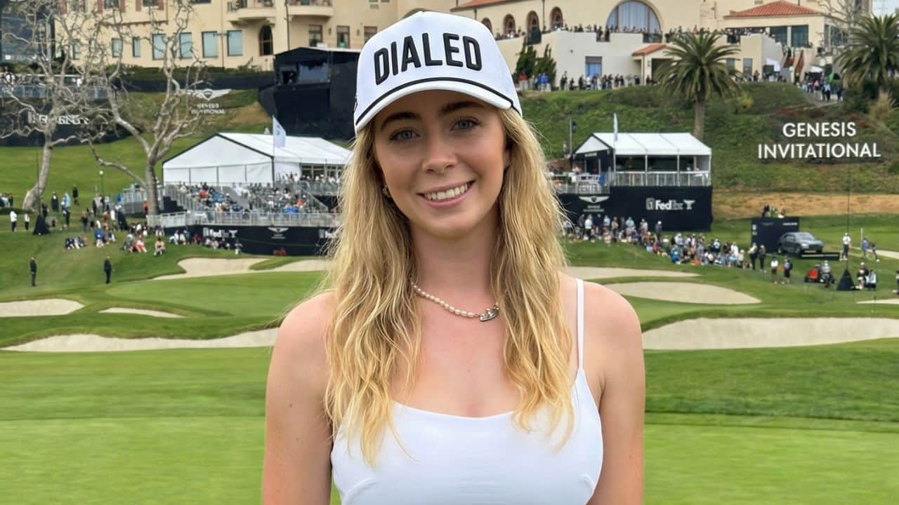 Grace Charis blends athletic style with subtle elegance, pairing a clean white top and pearl necklace with a statement snapback hat at the golf course.